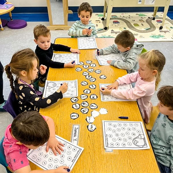 Image of children learning and playing in the PK4-5 classroom!
