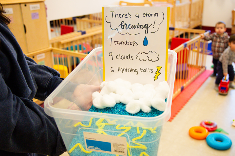 Image of kids playing in sensory bin